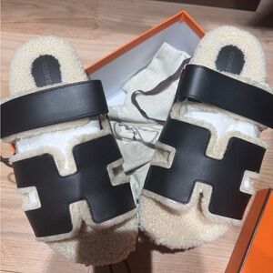 Hermès Black and Cream Shearling Sandals